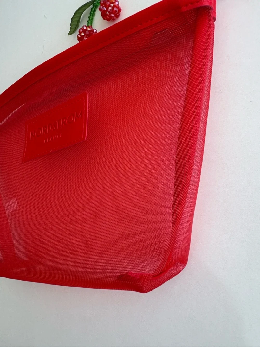 Nordstrom Beauty Bright Red Mesh Cosmetic Pouch with Wrist Strap and Cherry Char